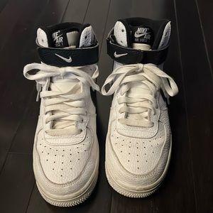 Black and white Nike Air Force 1s